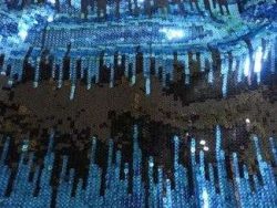 20131007_162101-1.jpg PAILLETTES NOIRES TURQUOISES SUR JERSEY