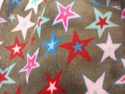 acheter_du_tissu_1009-1.jpg POLAIRE IMPRIME ETOILES MULTICOLORE