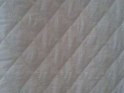 TISSUS MATELASSE BRODERIE ANGLAISE