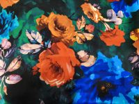 Fleurs multicolores sur fond vert et bleu