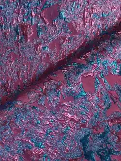 Tissu texturé violet et turquoise chatoyant