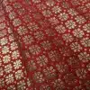 Tissu rouge motif floral argenté élégant