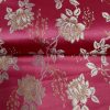 Tissu floral rouge et doré